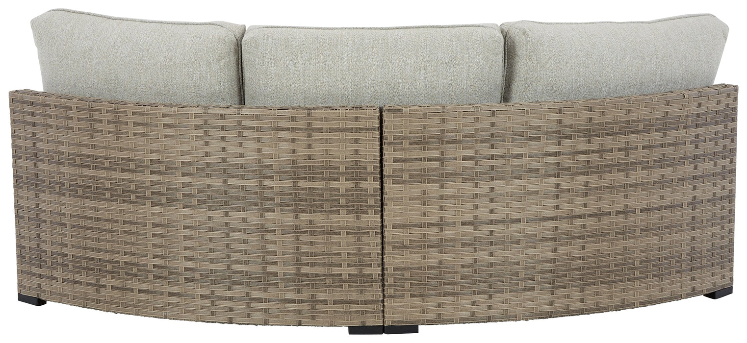 Calworth Outdoor Curved Loveseat with Cushion - P458-861 - In Stock Furniture